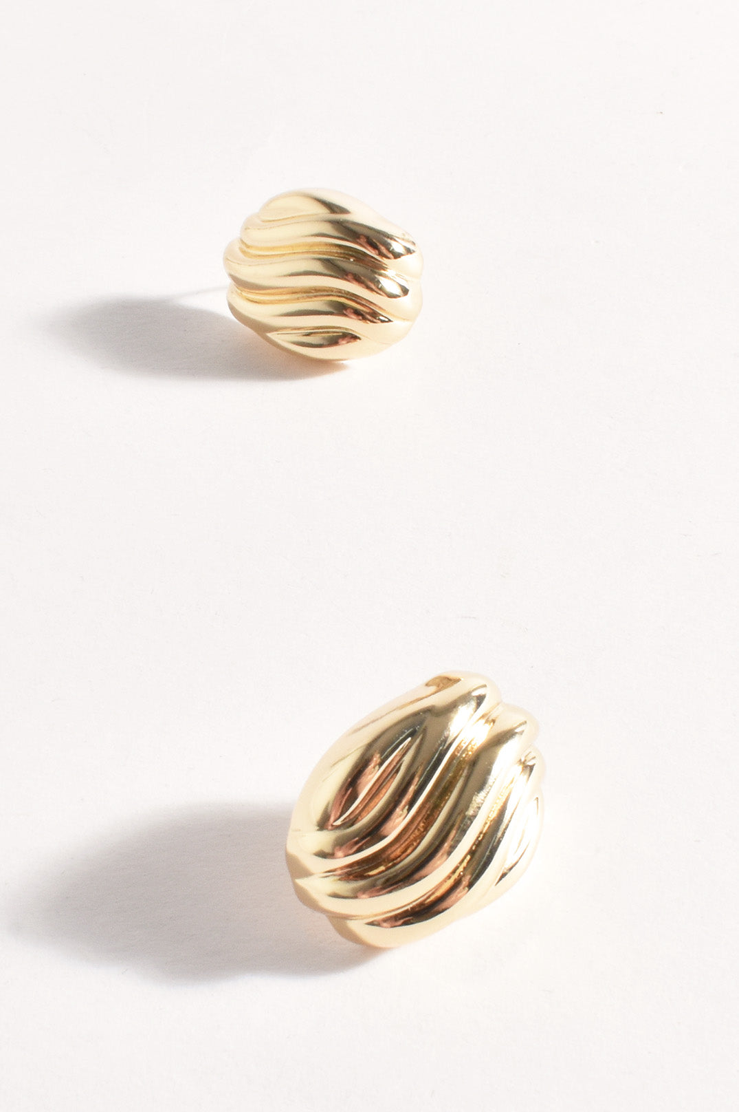 Adorne Wave Pattern Metal Stud Earrings