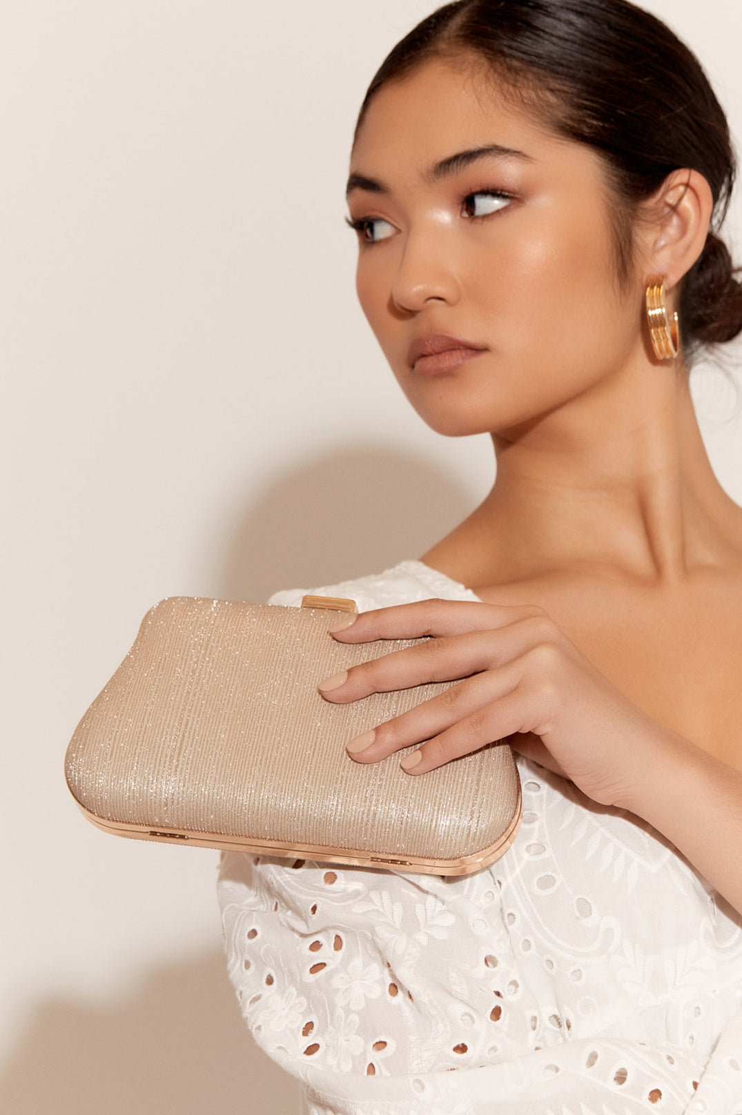 ADORNE ROXY DECO CURVED STRUCTURED CLUTCH